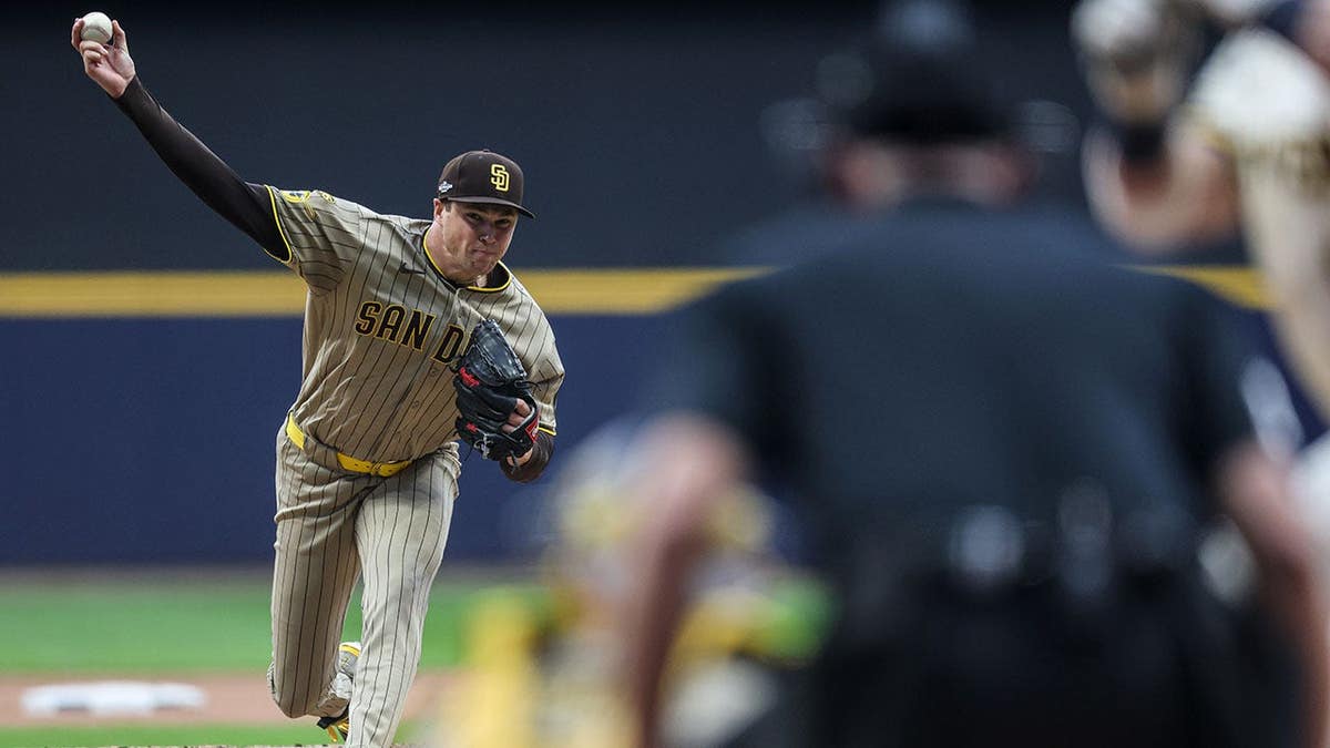 Mason Miller #22 of the San Diego Padres pitches during Game Two at American Family Field.