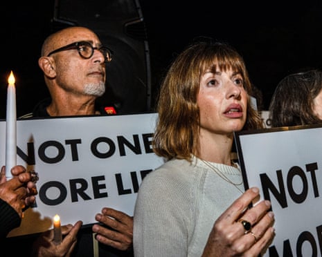 Attendees hold signs reading 'Not One More Life' at a New York vigil organised by the group Israelis for Peace on 7 October, 2026.